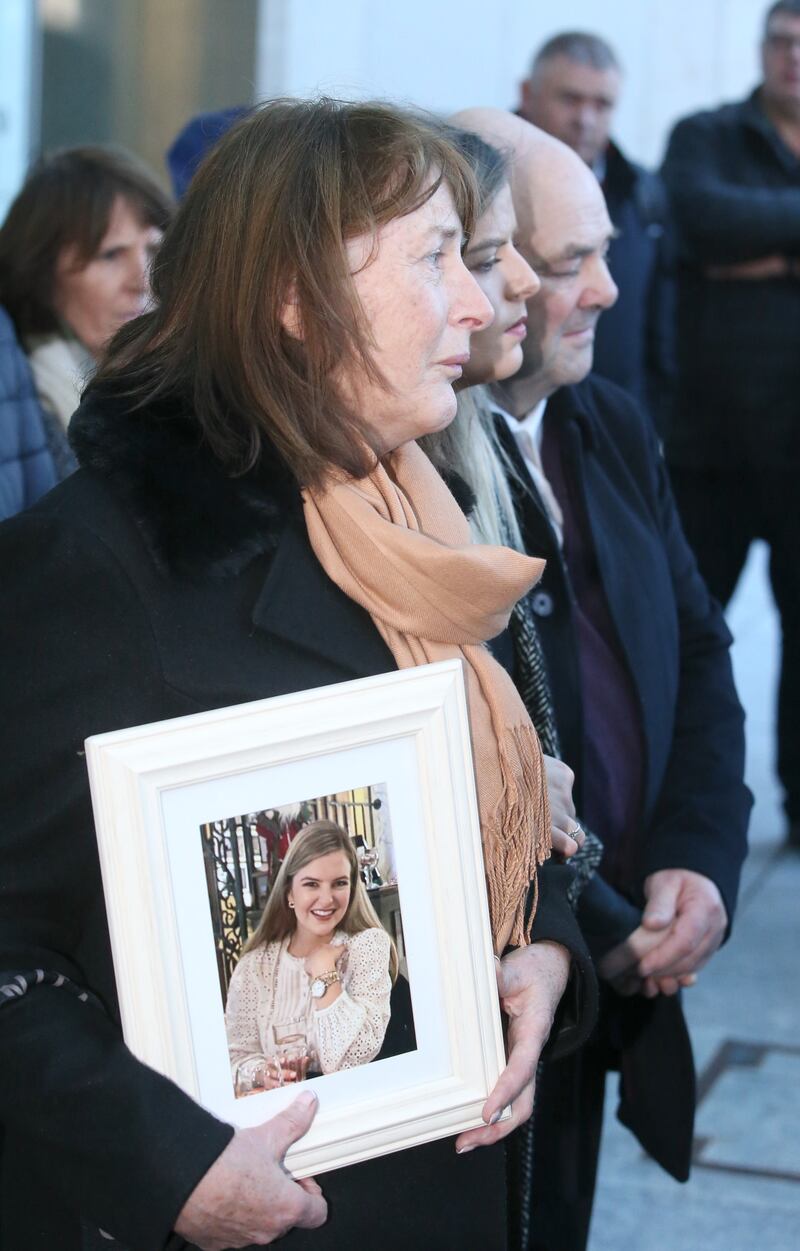 Ashling Murphy's mother Kathleen holding a photo of Ashling outside the Criminal Courts of Justice after Jozef Puska was found guilty of her murder. Photograph: Collins Courts