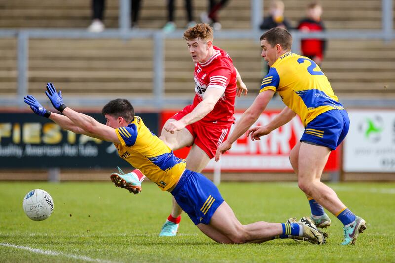 Derry’s Lachlan Murray and Roscommon's Niall Higgins and David Murray. Photograph: Lorcan Doherty/Inpho