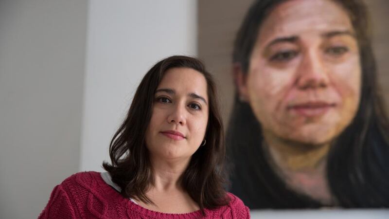 Male, female, Israeli, Palestinian: Veronica de la Guardia with Colin Davidson’s portrait of her