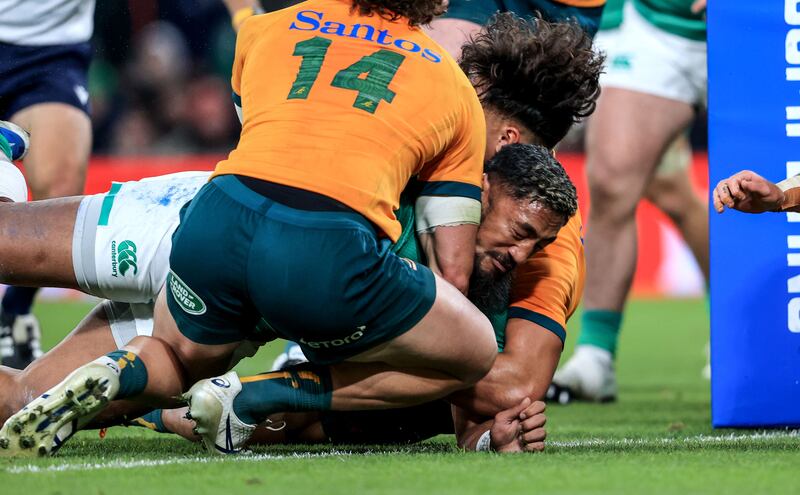 Bundee Aki gets over for Ireland's try. Photograph: Dan Sheridan/Inpho