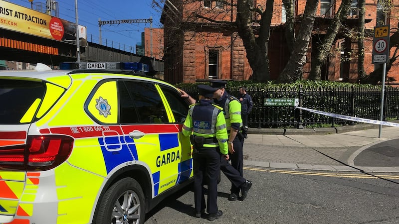 Gardaí at a cordoned off Sherriff Street after suspected explosive material was found near Connolly station
