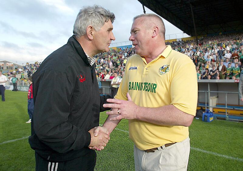 Managers Mick O'Dwyer and Páidí Ó Sé after the 2002 SFC qualifier between Kildare and Kerry. Photograph: Morgan Treacy/Inpho