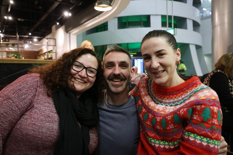 21/12/24 News Paul Dowling is welcomed home from Chicago by friends Leslie Alcock (left) and Aoife Ni Ghloinn  at Dublin Airport Terminal 2 over the weekend as thousands of Irish people living abroad arrived home for Christmas.
Photo: Bryan O’Brien / The Irish Times

