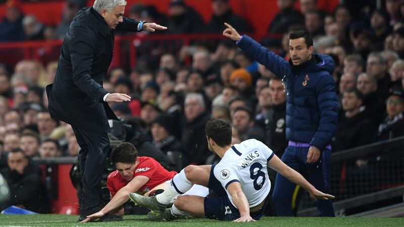 Manchester United’s  Daniel James collides with Tottenham Hotspur manager Jose Mourinho after being tackled by  Harry Winks during the game at Old Trafford. Photograph:  Stu Forster/Getty Images