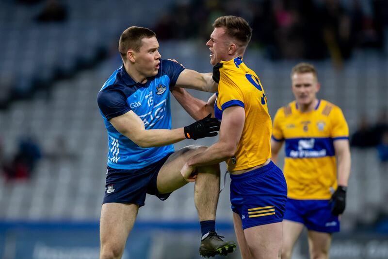 Dublin’s Con O’Callaghan and Darragh Bohannon of Clare get involved off the ball. Photograph: Morgan Treacy/Inpho