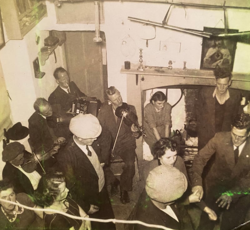 Kilfenora, 1955. Aoife Kelly's maternal grandfather is Jimmy O’Donoghue (96), from the townland of Clogher. When Kelly found rare photographs of house dances from the area in his home, 'Jimmy could tell me everybody in the photo, where it was, when it was...'