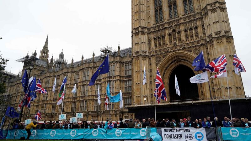 Pro and anti-Brexit demonstrators protest outside Houses of Parliament in London on October 14, 2019, following the State Opening of Parliament. Photograph: Niklas Halle’n/various sources / AFP via Getty Images