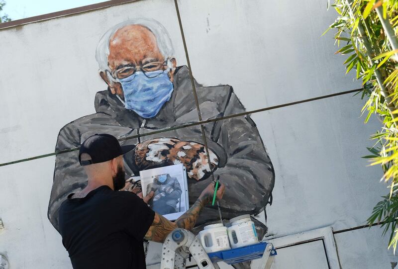Artist Jonas Never  paints a mural of senator Bernie Sanders in Culver City, California on January 24th. Photograph: Chris Delmas/AFP via Getty