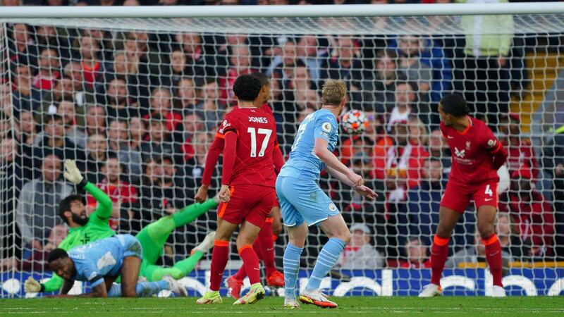 De Bruyne’s shot is deflected off Matip to equalise for City. Photo: Peter Byrne/PA Wire