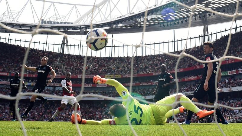 Arsenal’s Alexandre Lacazette scores their fourth goal in the Premier League game against West Ham at the Emirates Stadium. Photograph: Tony O’Brien/ Action Images via Reuters