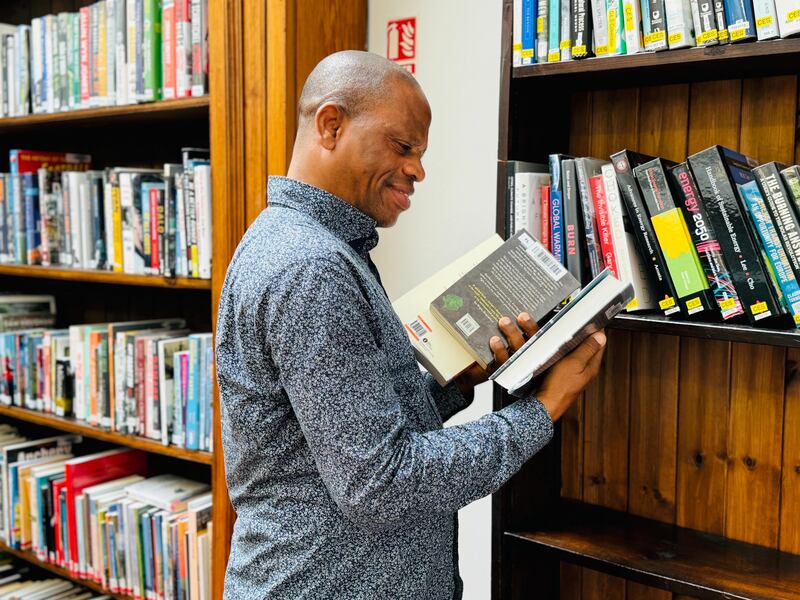 Adeyemi A.A. Soetan finds inspiration at Kevin Street Library, envisioning a future of learning and opportunity for his children. Photograph: Saeedullah Safi