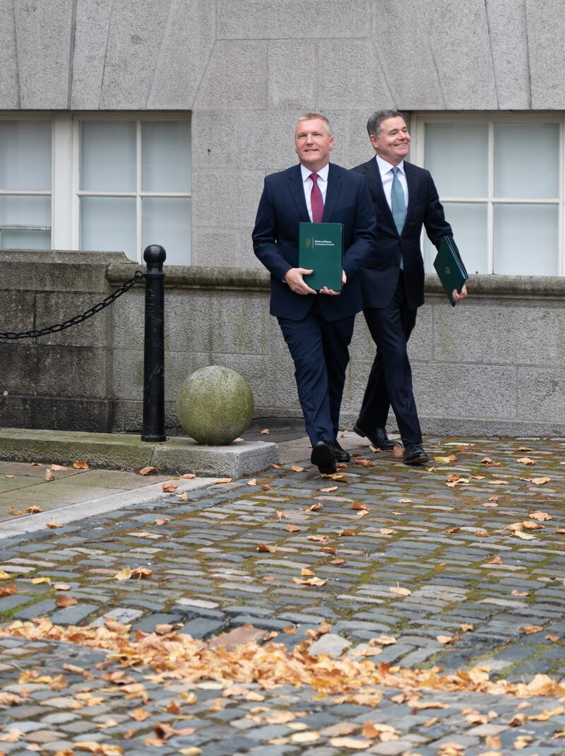 2023: Michael McGrath and Paschal Donohoe arrive at a photocall for the budget at Government Buildings. Photograph: Barry Cronin