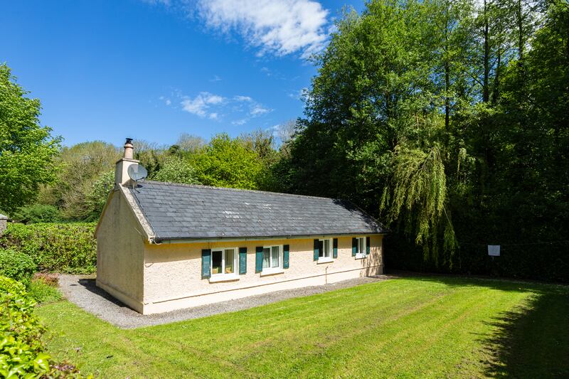 The property includes a one-bedroom cottage