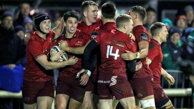Munster players celebrates with Joey Carbery after he scores a try. Photo: Bryan Keane/Inpho