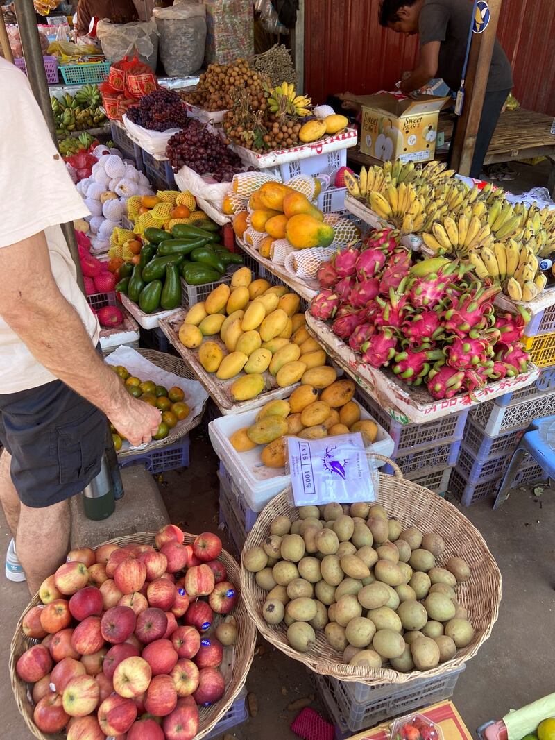 The bustling Rolous Market near the school