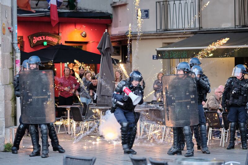 Police come under attack in Paris during protests following the results of the second round of the Frence  legislative elections.  Photograph:  Adrien Auzanneau/Hans Lucas via AFP