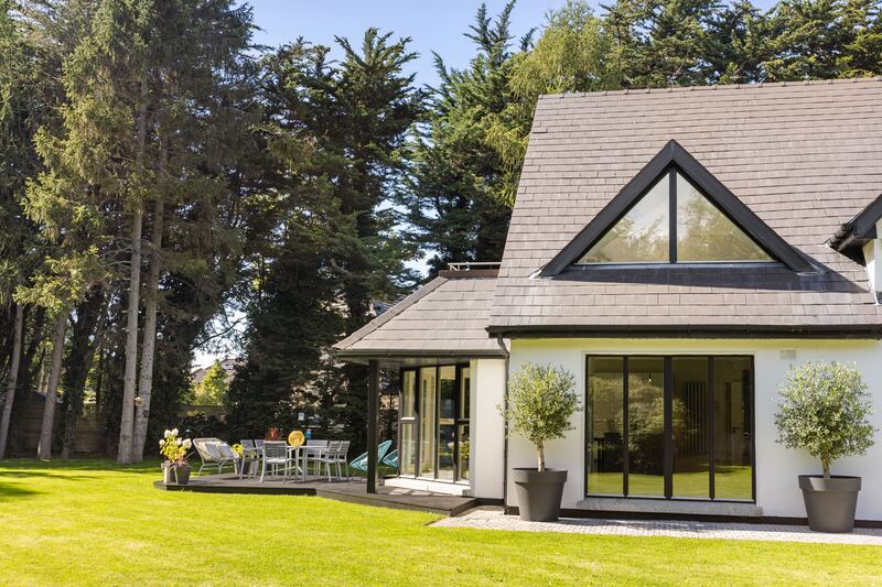 The spectacular 0.85-acre grounds are super-private.