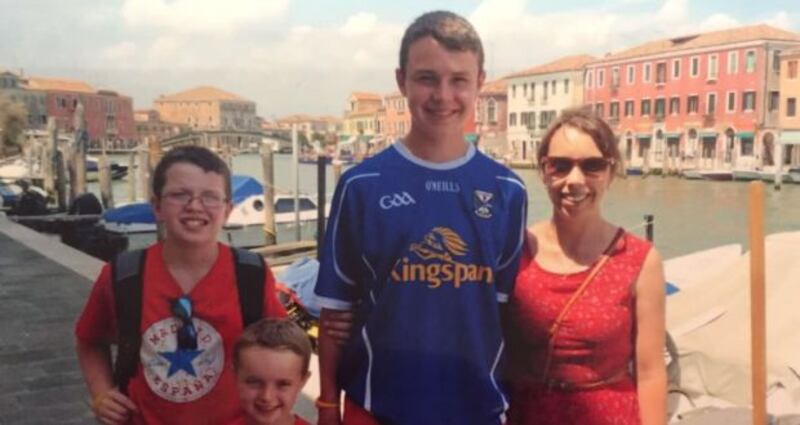 Clodagh Hawe and her sons, from left, Niall, Ryan, Liam. Photograph: Jacqueline Connolly