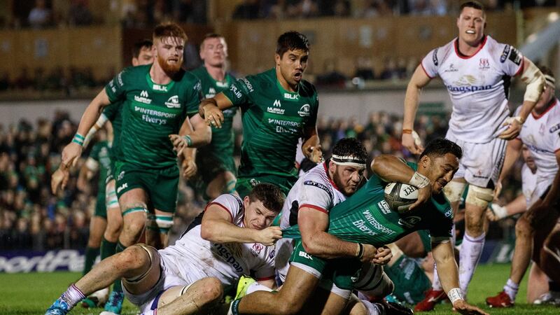 Bundee Aki reaches to score during Connacht’s win over Ulster in Galway. Photograph: James Crombie/Inpho