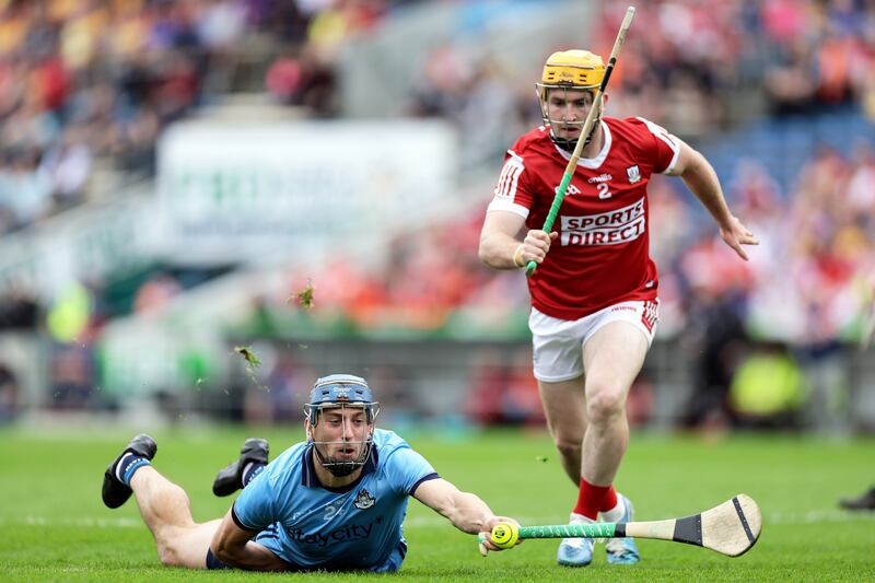 Dublin's Paul Crummey battles with Niall O’Leary of Cork. Photograph: Laszlo Geczo/Inpho