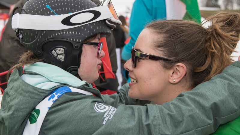 Laoise Kenny, a member of Kilternan Karvers Special Olympics Club, from Monkstown, Co Dublin, with her sister Caoimhe at Schladming-Rohrmoos, Stadthalle Graz, in Graz, Austria. Photograph: Ray McManus/Sportsfile