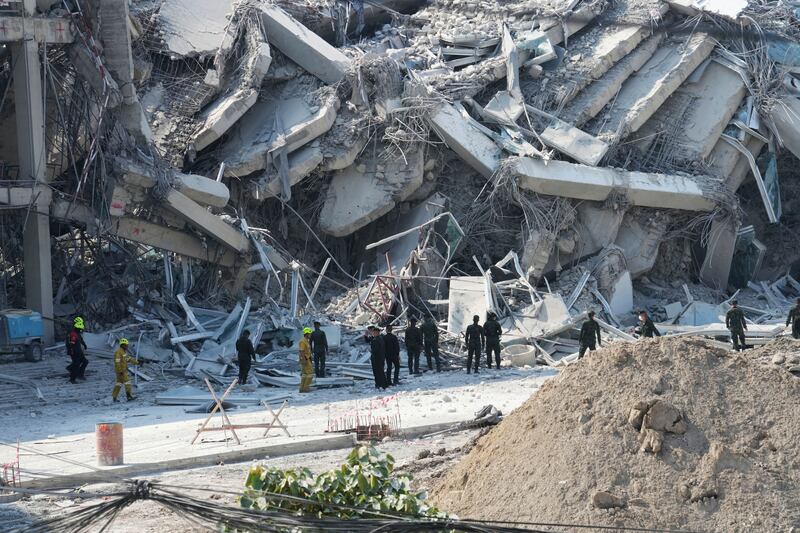 Myanmar and Thailand earthquake: Rescuers work at the site of a high-rise building under construction that collapsed after the 7.7 magnitude earthquake in Bangkok. Photograph: Sakchai Lalit/AP