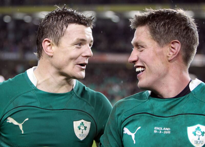Ireland's Brian O'Driscoll and Ronan O'Gara celebrate beating England in the Six Nations in 2011. Photograph: Dan Sheridan/Inpho