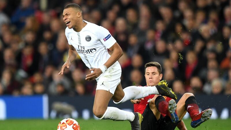 Mbappé is fouled by Ander Hererra in the second half. Photo: Michael Regan/Getty Images