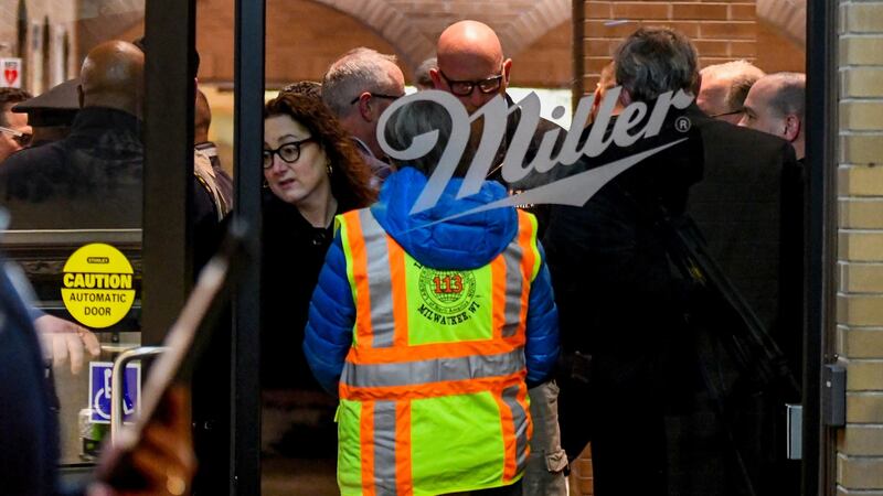 People stand in the lobby of the Milller Coors campus after a press conference by the company’s CEO in Milwaukee, Wisconsin, on Wednesday.  Photograph: Matt Marton/EPA