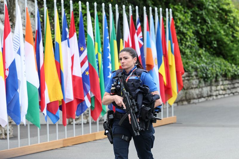 A Swiss police officer stands guard during the summit in Lucerne. Photograph: Sedat Suna/Getty Images
