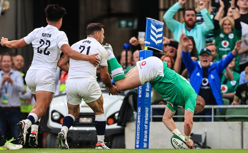 Ireland's Keith Earls scores a try against England. Photograph: Evan Treacy/Inpho
