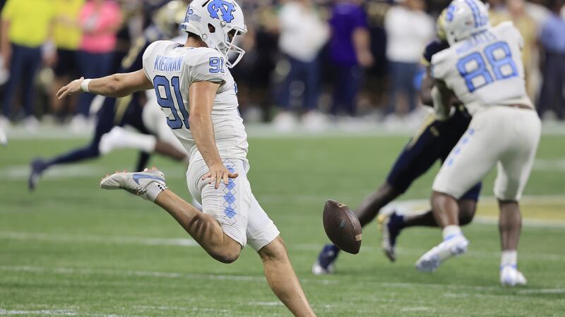 Ben Kiernan of the North Carolina Tar Heels punts while playing against the Georgia Tech Yellow Jackets. Photograph: David J. Griffin/Getty Images