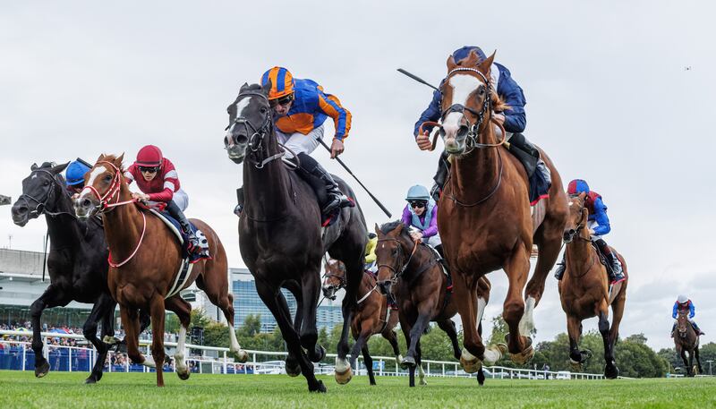 Tom Marquand on Economics (right) wins ahead of Ryan Moore on Auguste Rodin in the Royal Bahrain Irish Champion Stakes (Group One) at Leopardstown in September. Photograph: James Crombie/Inpho