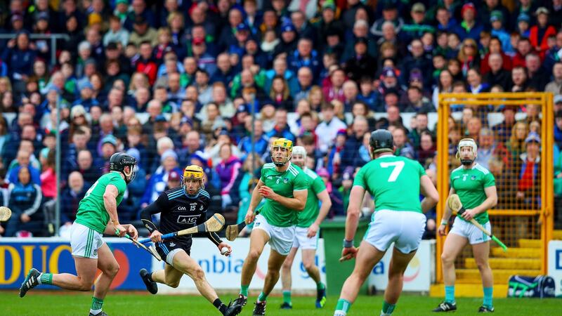 Dublin’s Eamon Dillon surrounded by Limerick players. On Sunday, the message was simple – flood the middle third, win the ball by having a numerical advantage, then work the ball in triangles from there. Photograph: Tommy Dickson/Inpho