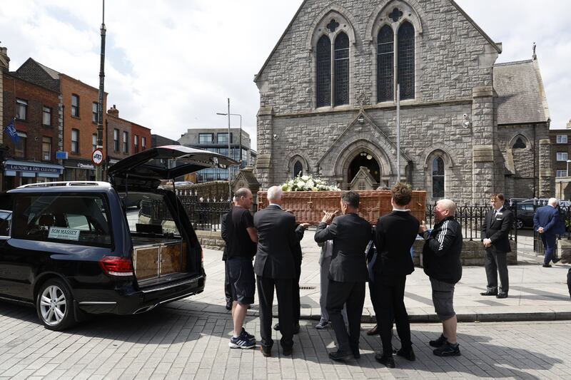 The poet's remains are brought to St Patrick's Church, Ringsend, Dublin. Photograph: Nick Bradshaw 