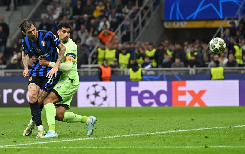 Not to be outdone,  Francesco Acerbi scores an equaliser despite the close attentions of  Ronald Araujo. Extra time looms as a result. Photograph:  Dan Mullan/Getty Images