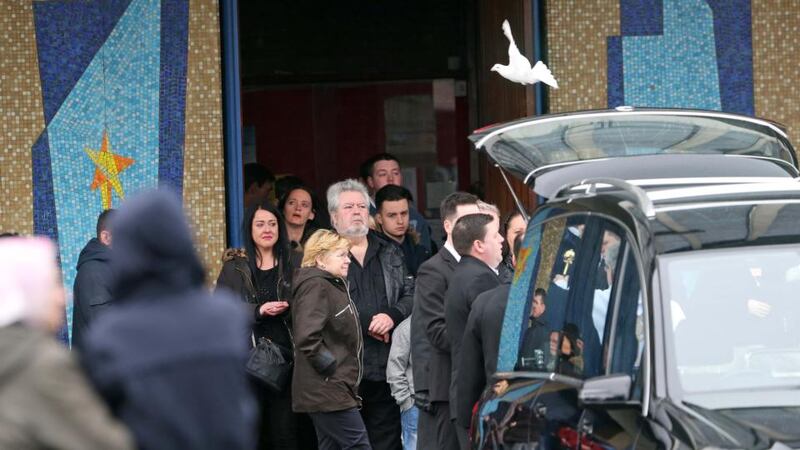 Doves are released as relatives console each other at the funeral of  Tyler Joyce (3),   at the Church of  The Annunciation, Finglas, on Friday morning.  Photograph: Colin Keegan/Collins Dublin