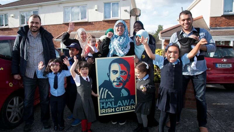 Family and friends celebrate the news that Ibrahim Halawa has been acquitted in a Cairo court. Photograph: Gareth Chaney/Collins