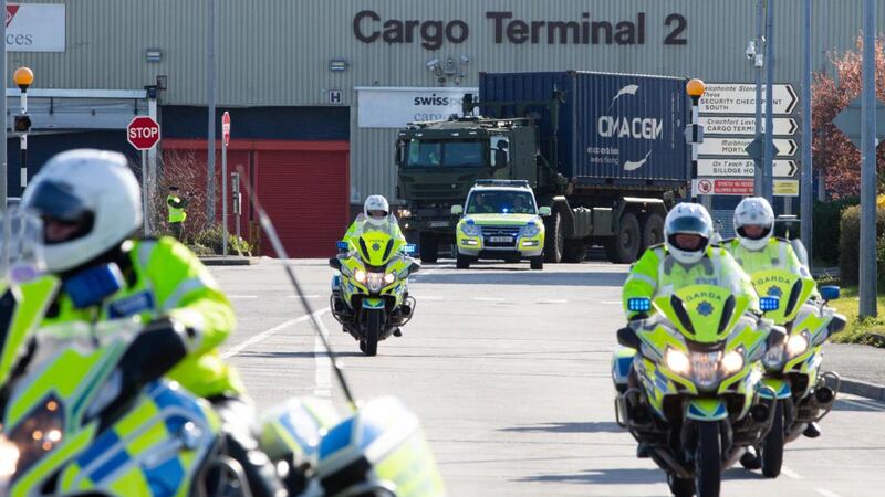Army vehicles escorted by An Garda leave Dublin Airport with a cargo of newly delivered Covid-19 equipment just in from China. Photograph: Tom Honan