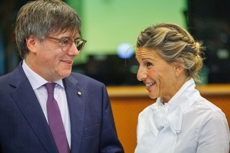 Carles Puigdemont and Spanish second deputy prime minister and Sumar alliance leader Yolanda Díaz speak in Brussels on September 4th last. Photograph: Olivier Matthys/EPA