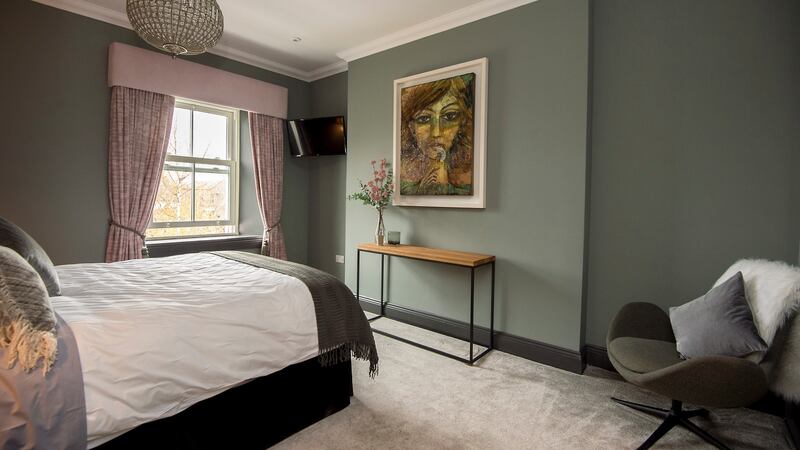 ‘Although we are now in a smaller bedroom, it actually feels bigger as we just have the bed, two side tables and a nursing chair’. Photograph: Brenda Fitzsimons