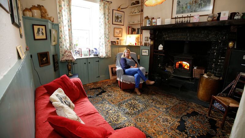 The shop leads into a cosy family sitting room. Photograph: Nick Bradshaw for The Irish Times