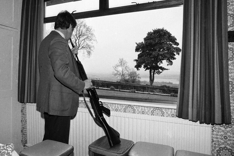 A part-time UDR soldier in Fermanagh keeps watch at home in May 1981. Photograph: Alex Bowie/Getty Images