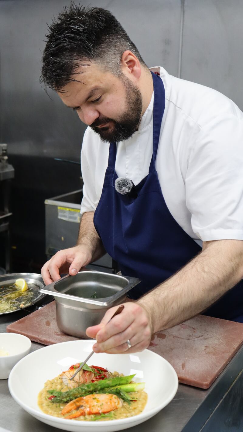 Readying a plate at the Blue Haven Hotel