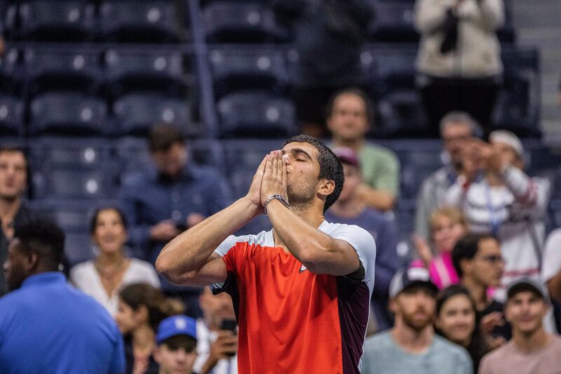 Carlos Alcaraz of Spain salutes the late-night crowd after winning his US Open quarter-final against Italy’s Jannik Sinner. Photograph: Hiroko Masuike/The New York Times