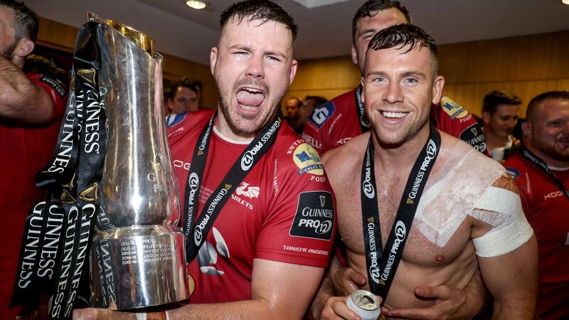 Scarlets celebrate with the trophy last season. Photograph: Inpho