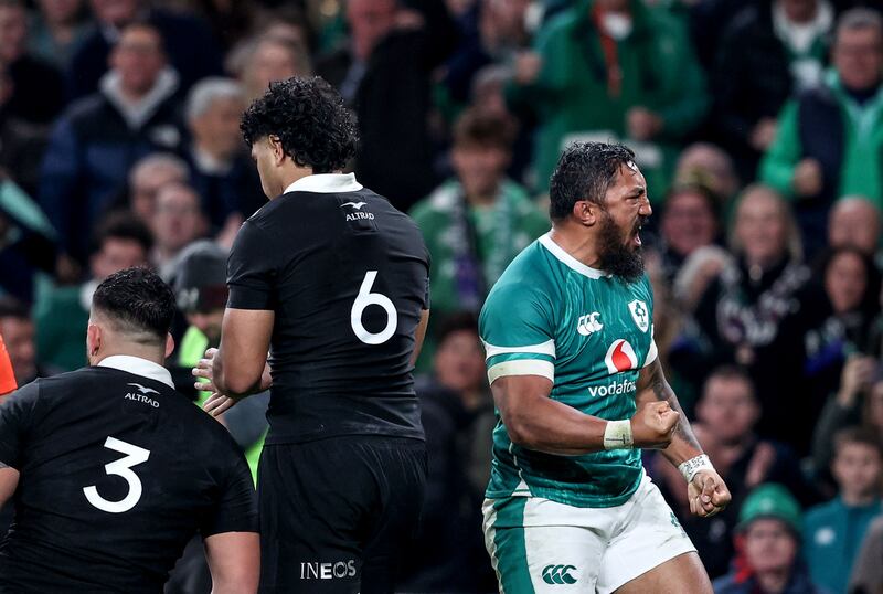 Bundee Aki celebrates Josh van der Flier's try. Photograph: Dan Sheridan