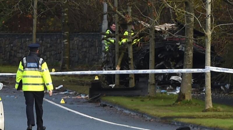 Garda forensic collision investigators at the scene of the fatal crash on the Killala Road in Ballina, Co Mayo,   in which two young men died. Photograph: David Farrell