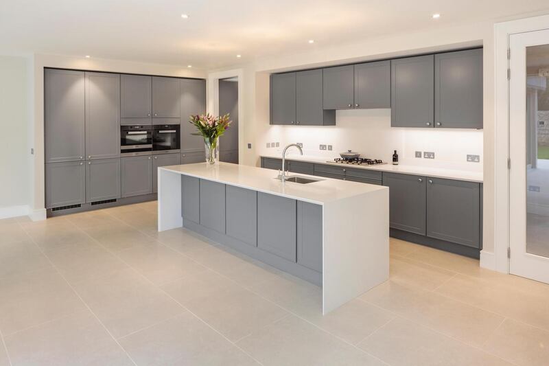 The kitchen is equipped with Miele appliances.