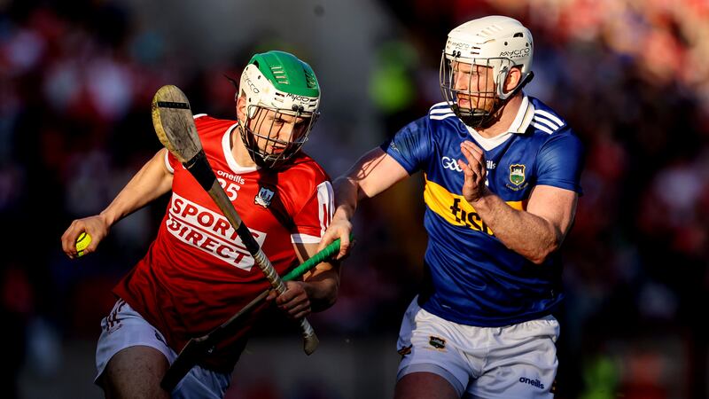 Cork's Shane Kingston with the ball against Michael Breen in the Munster GAA Senior Hurling Championship in Páirc Uí Chaoimh. Photograph: Ben Brady/Inpho